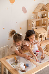 little girls playing at home on christmas