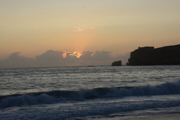 Golden Sunset Over the Cliffs of Portugal's Coastline