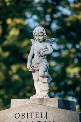 Zagreb, Croatia - August 15, 2024: A close-up of a burial at Mirogoj Cemetery in Zagreb, one of the most beautiful cemeteries in Europe