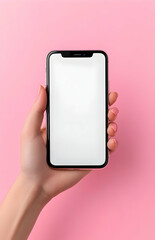 Hand holding smartphone with blank screen on pink background.