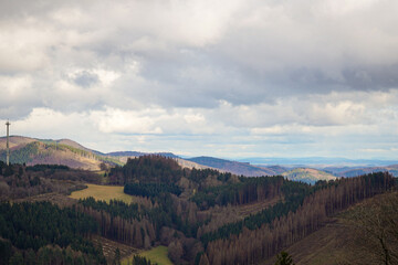 Moody hill valley at Winterberg, Sauerland, Germany, Early spring