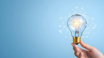 Hand-holding lightbulb icon with various symbols on blue background, representing ideas and innovation