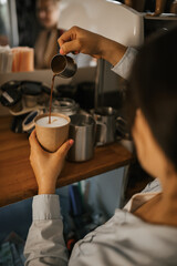 pouring coffee into a cup