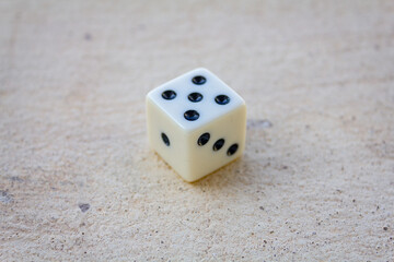 white dice put on a wall