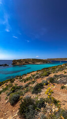 Turqoise water at the blue lagoon near the rocky beach