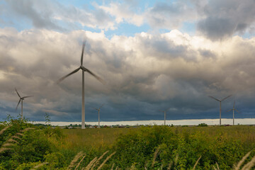 A view of windmills generating electricity from renewable energy sources
