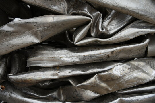 Smashed crushed twisted compressed metal pipes, steel, metallic, scrap metal industry
