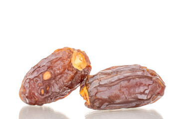 Dried sweet dates  isolated on white background, close-up.
