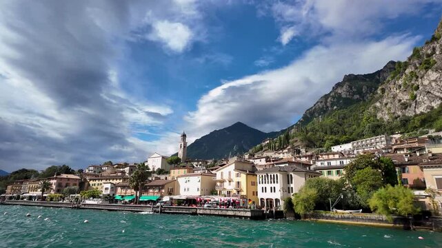 Panoramic view of Lake Garda and the town of Limone sul Garda, Italy. View from the lake.