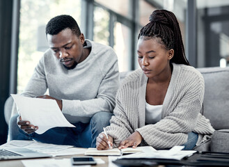 Apartment, black couple and writing with paperwork on sofa for finance plan or interest rate on...