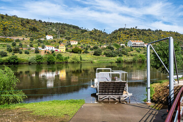 Walking along the Barca da Amieira walkways in Amieira do Tejo, Portugal.