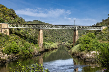 Walking along the Barca da Amieira walkways in Amieira do Tejo, Portugal.