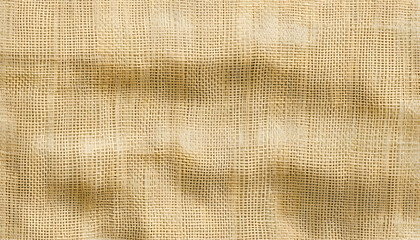 Close-up of woven burlap fabric, showcasing its natural texture and warm beige color.