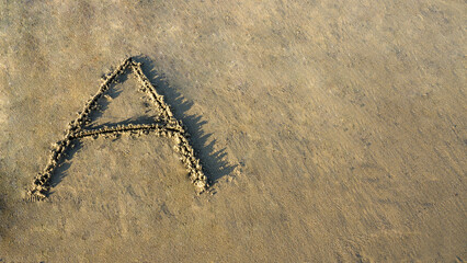 Letter A Drawn in Beach Sand