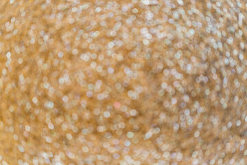 Abstract blurry golden  bokeh background, close up.