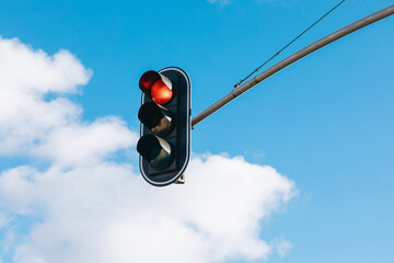 Hanging Traffic Light Against the Sky