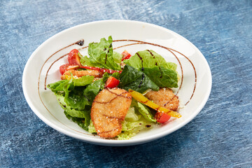 chicken nuggets with salad and sauce