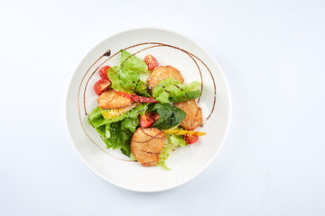 chicken nuggets with salad and sauce