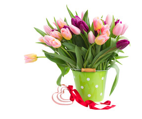 bouquet of multicolored   tulip flowers in white pot