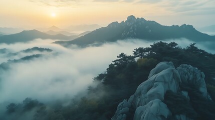 Beautiful mountain landscape sunrise with mist fiery orange sky picture
