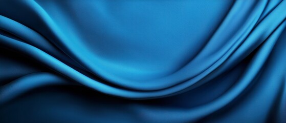 Fototapeta premium A close up of a blue fabric with a black background
