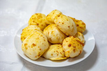 Traditional Mineiro cheese bread typical of Brazil. Cheese Breads | Pão de Queijo | Typical Brazilian Food | Breakfast Table