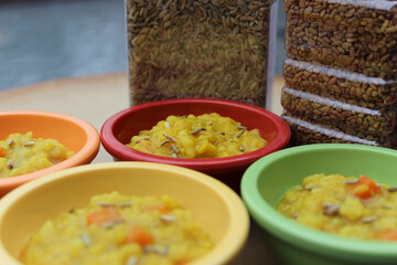 Dal kitchari Indian one pot meal with fenugreek and fennel seeds nutritious background