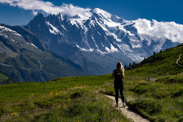 Obraz premium Woman tourist with Mont Blanc in the background in France. The Alps and the highest peak in Europe,