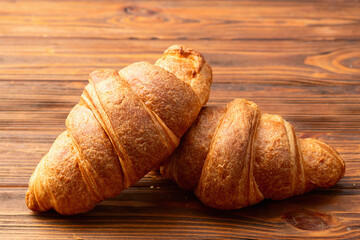 Group of sweet croissant . French morning breakfast . Top view