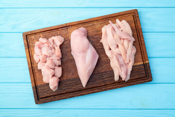 Raw chicken meat fillet ( breast ) Various of cutting in form slice and cube
