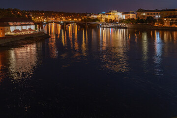 Panoramic view of Prague during a warm autumn night