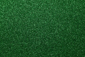 Shiny green glitter texture background