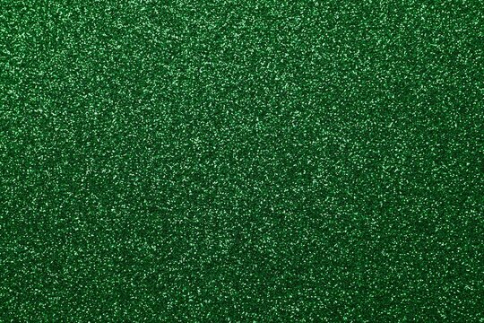 Shiny green glitter texture background