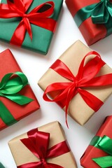 Beautiful gift boxes tied with bows on white background 