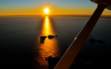 Fototapeta premium Sunset from plane