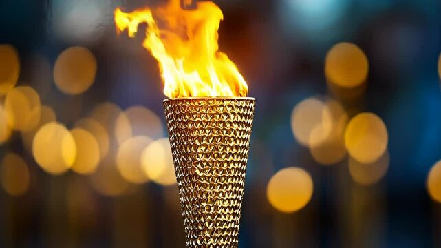 A golden torch burns brightly, a symbol of hope and inspiration, against a backdrop of out-of-focus lights