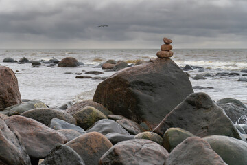 Zen concept. The object of the stones on the beach at sunset. Relax & Meditation.