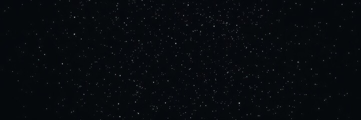 Fototapeta premium Night sky filled with twinkling stars against a dark black backdrop, night