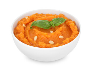 Tasty mashed sweet potato with basil and seeds in bowl isolated on white