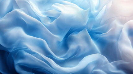Obraz premium Soft blue fabric draped gracefully, creating gentle waves of texture and color