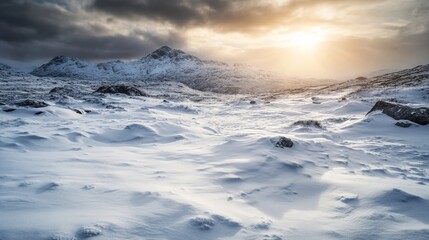 Fototapeta premium Snowy Landscape with Mountains at Sunrise in a Cold Winter Scene