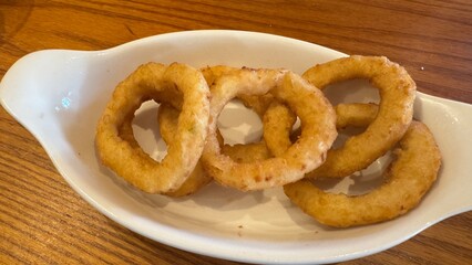 Five Onion Rings in White Dish