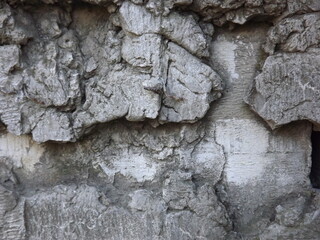 Concrete with weathered rocks