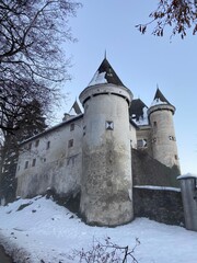 Fototapeta premium Enchanting Winter Wonderland: Snow-Covered Castles and Christmas Lights