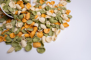 Raw pasta background close up. Different types of pasta and noodles on color background. Italian cuisine culinary concept. Collection of different raw pasta on cooking table