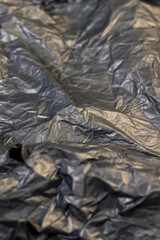 a piece of black soft paper for packaging goods and objects