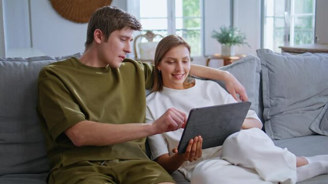 Romantic couple shopping online at family weekend zoom on. Teenagers embracing