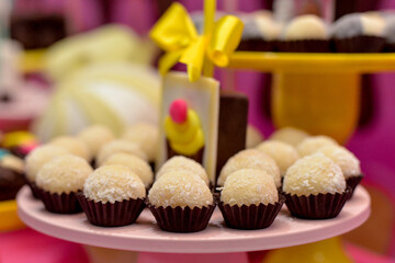 candies in a box, sweets, candy in a box, fine sweets, white brigadeiro, white chocolate , display with sweets, candy store, coffee shop, party sweets, candy balls,  candy table
