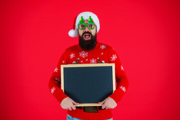 Happy New Year. Xmas holiday advertisement. Santa Claus man offer New Year sale. Santa man offer...