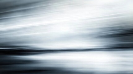 Abstract blurred background in shades of gray white and black